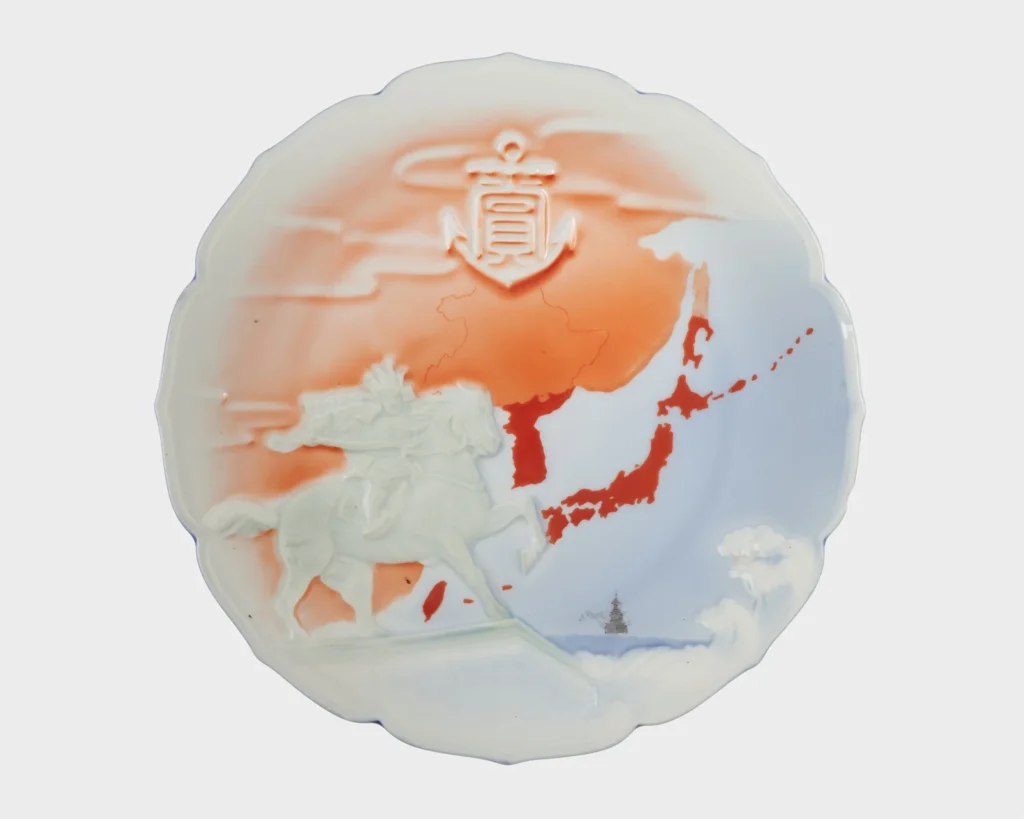A porcelain dish depicting a mounted warrior and map of Japan reflects how samurai imagery shaped national identity and visual culture. © The Trustees of the British Museum copy