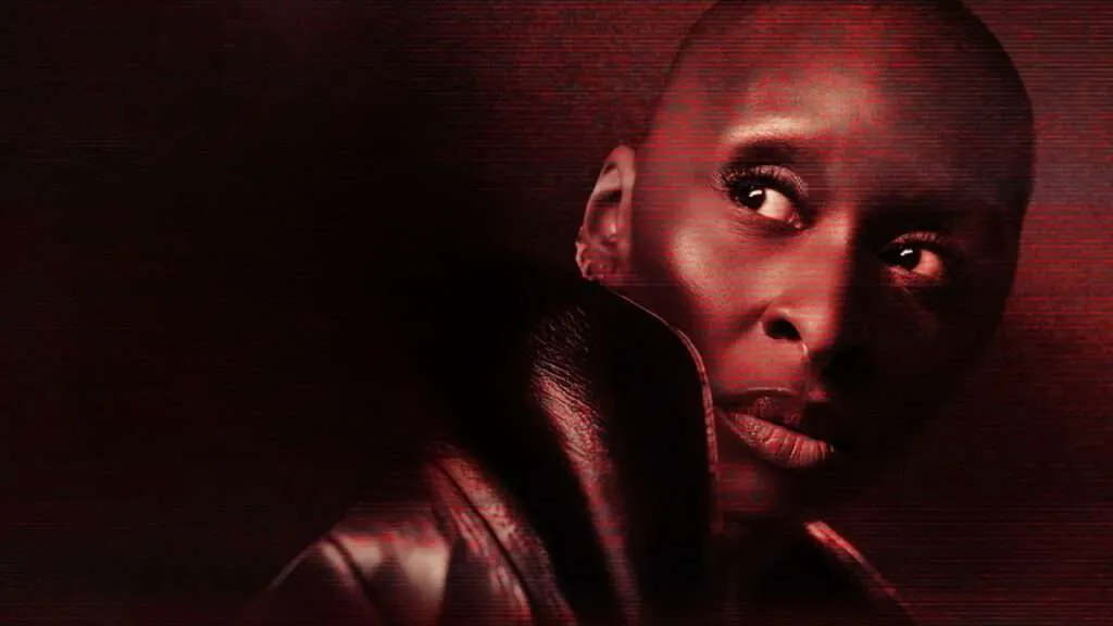Cynthia Erivo in Dracula Noel Coward Theatre review production shown in red lighting with dramatic close up portrait