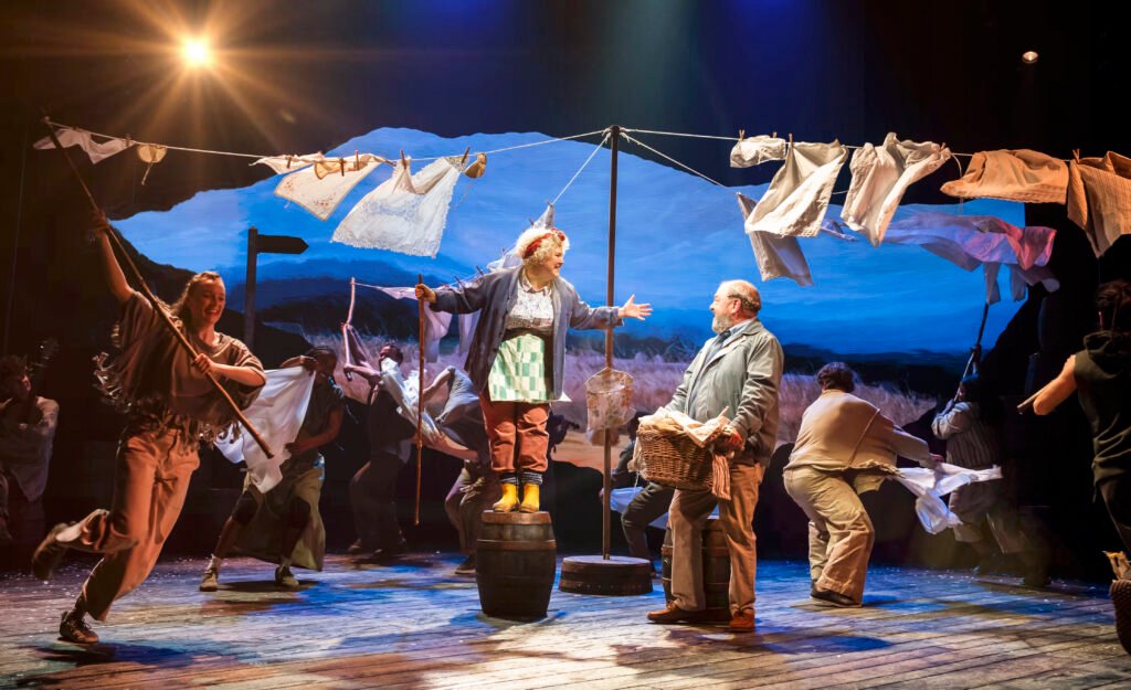 Jenna Boyd (Farmer’s Wife) and Mark Addy (Harold Fry) in a scene from The Unlikely Pilgrimage of Harold Fry at the Theatre Royal Haymarket.