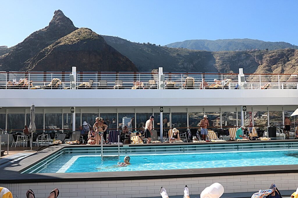 Life on board Spirit of Adventure, where the pool deck offers a place to pause between island stops.