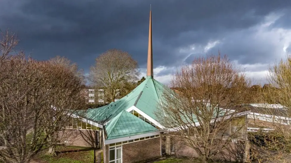 London heritage funding repairs at St Richard’s Church showing distinctive modernist roof and spire