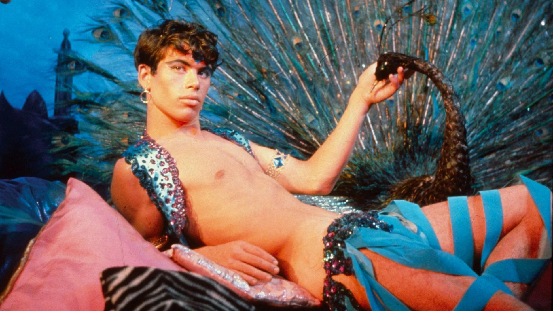 Pink Narcissus film 4K restoration still showing Bobby Kendall in vivid surreal dreamlike scene (1)