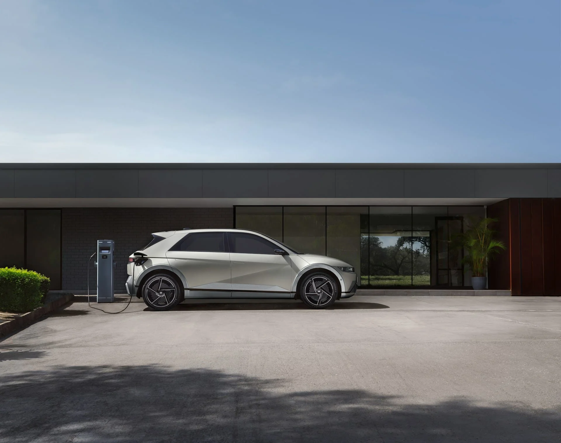 webp a silver hyndai ioniq 5 charging an ev not made in europe