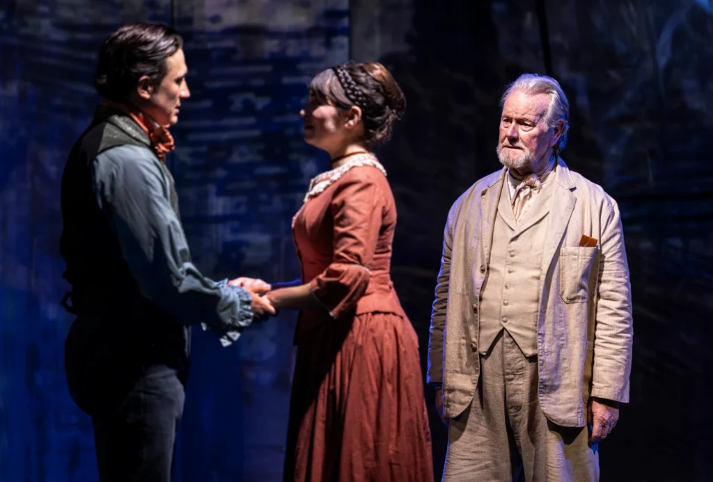 Dean John Wilson and Brooke Bazarian as Monet and Camille, with Jeff Shankley as the older Monet, in A Mirrored Monet at Charing Cross Theatre.