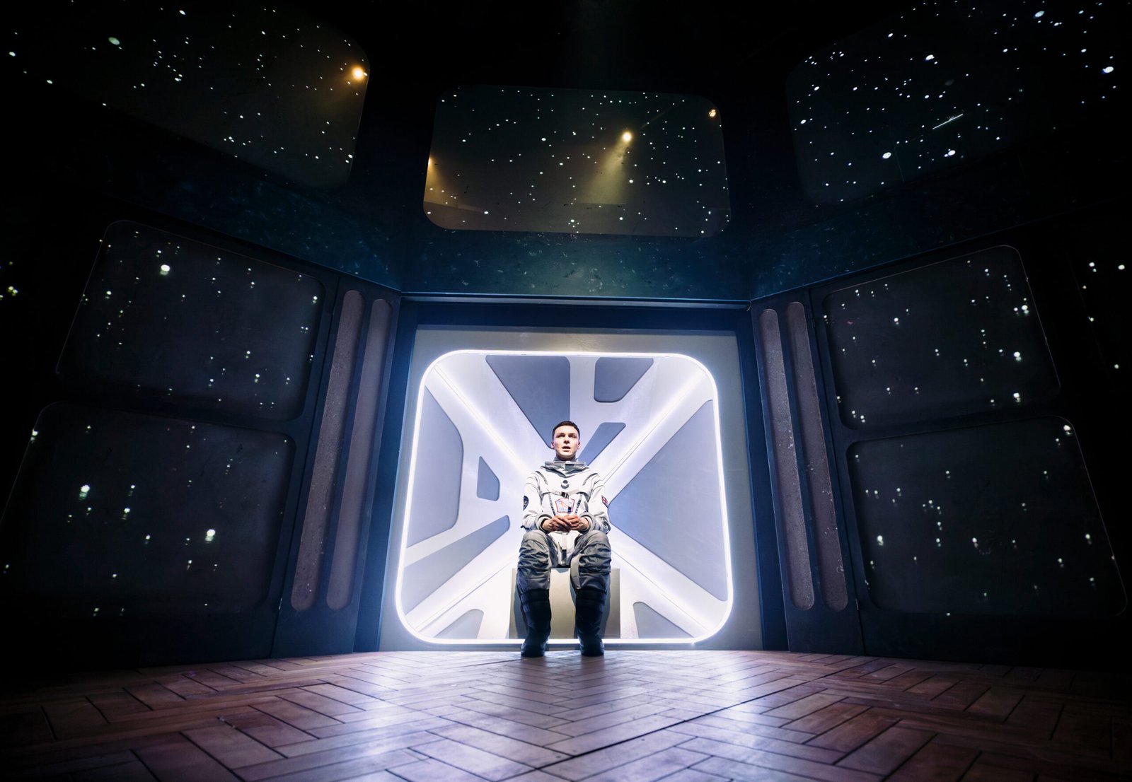Flyby Southwark Playhouse astronaut stage scene with Daniel in spacecraft set