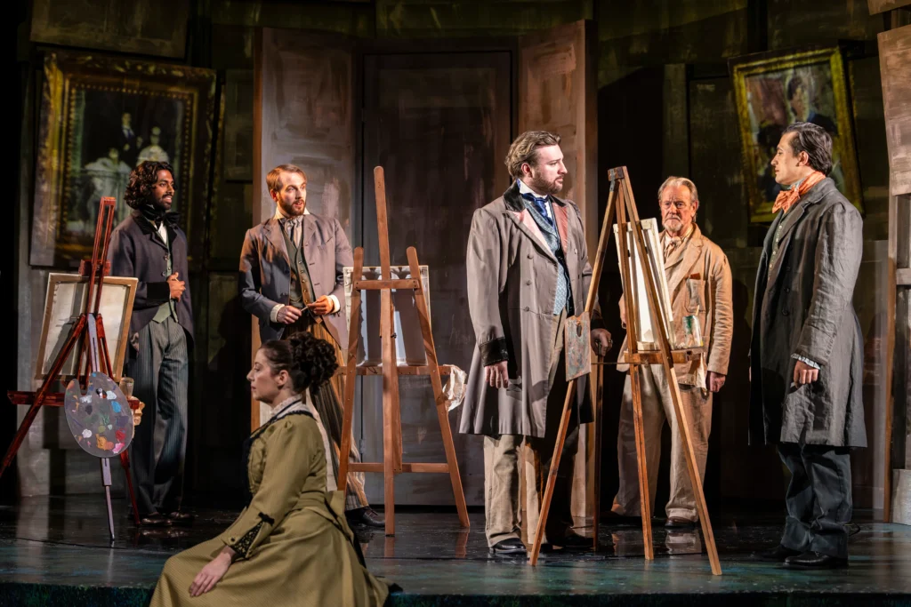 The ensemble cast (Ritesh Manugula, Sam Peggs, Natalie Day, Aaron Pryce Lewis, Jeff Shankley and Dean John Wilson) in A Mirrored Monet at Charing Cross Theatre.