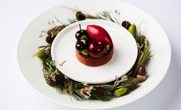 Image 1 Black Forest dessert with kirsch mousse, white chocolate, Amarena cherries and morello sorbet at CORD by Le Cordon Bleu.