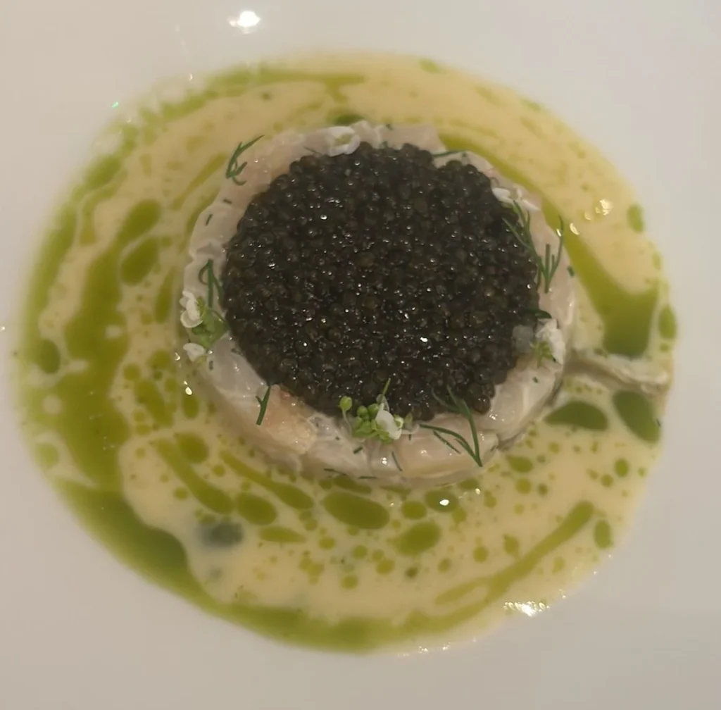 Image 3 Isle of Skye Scallop Tartare with oyster, Oscietra caviar and kaffir lime, a beautifully balanced dish in which citrus brightness lifted the richness of the shellfish and caviar.The Isle of Skye scallop tartare followed, paired with oyster, Oscietra caviar and kaffir lime.