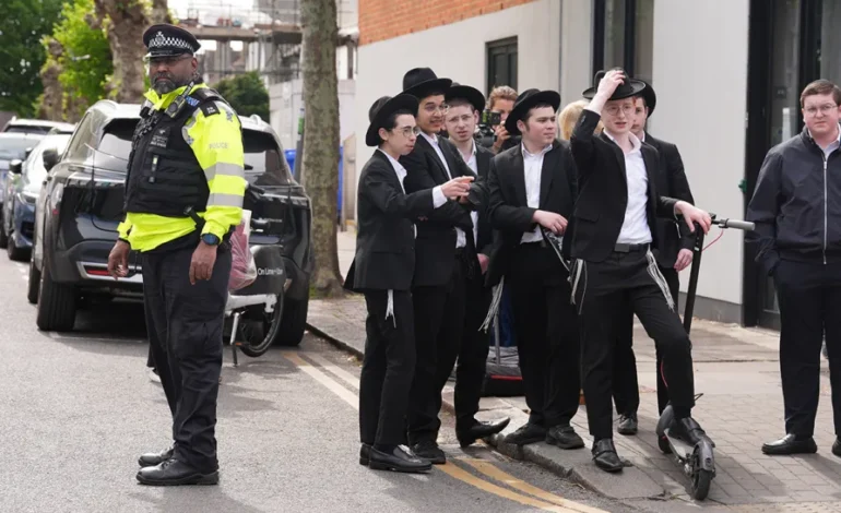 Metropolitan Police officers patrol near Jewish community sites in north London after antisemitic attacks