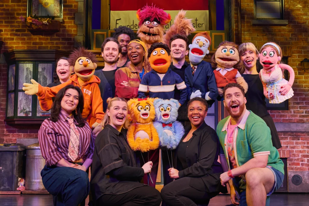The company of Avenue Q at the Shaftesbury Theatre, London. Image Credit Matt Crockett