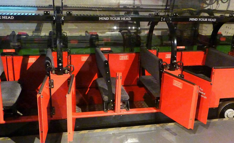 Passenger seating inside the Mail Rail carriages at the Postal Museum London