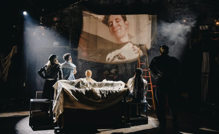 Cast watch archival Jonathan Larson footage in The Jonathan Larson Project at Southwark Playhouse