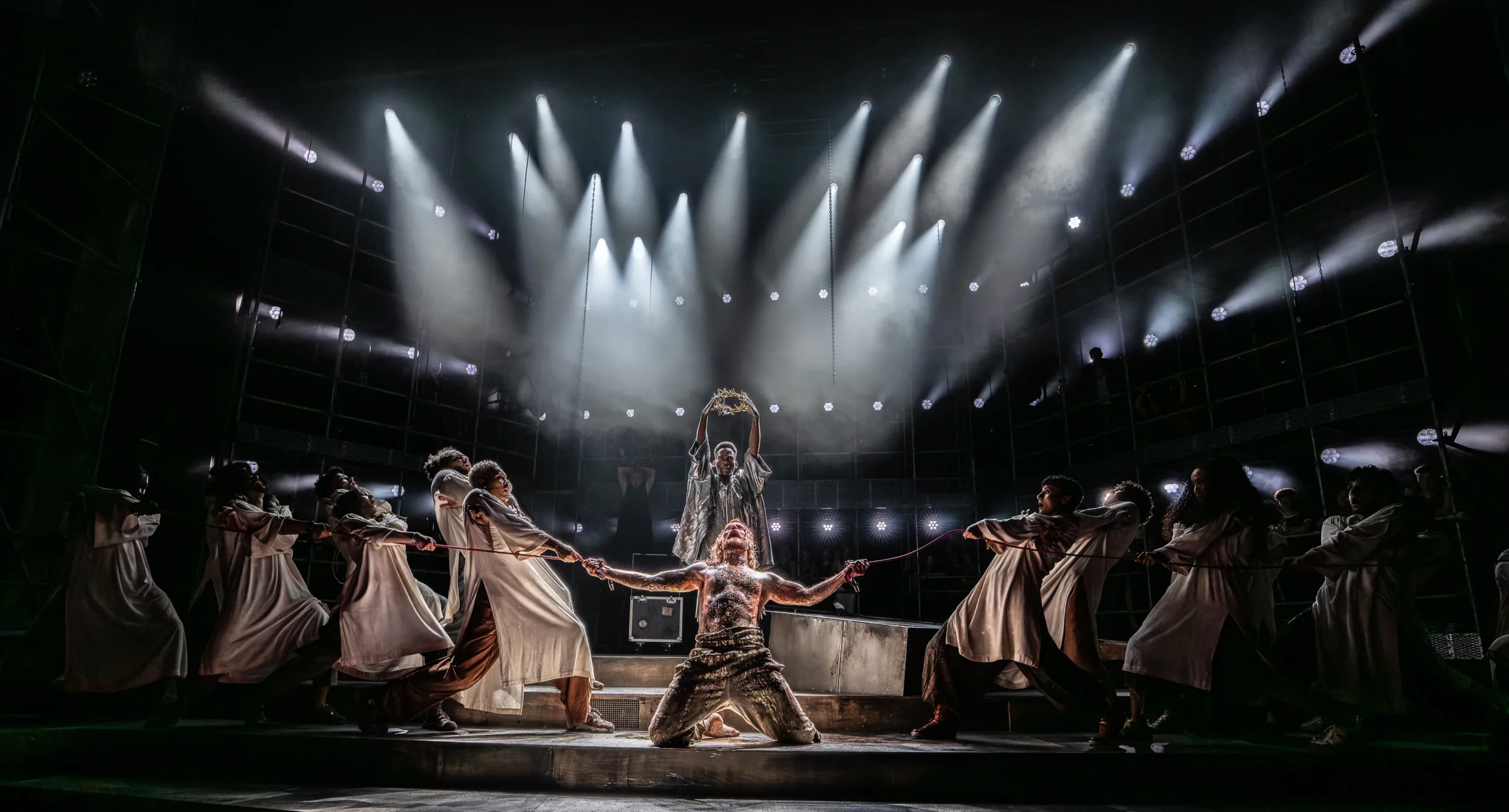Jesus Christ Superstar Palladium crucifixion scene with ensemble and crown of thorns