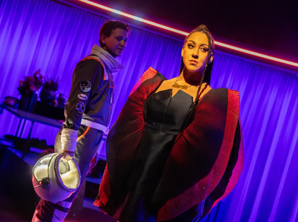 Morgan Gregory as Humanity and Danielle Steers as Earth