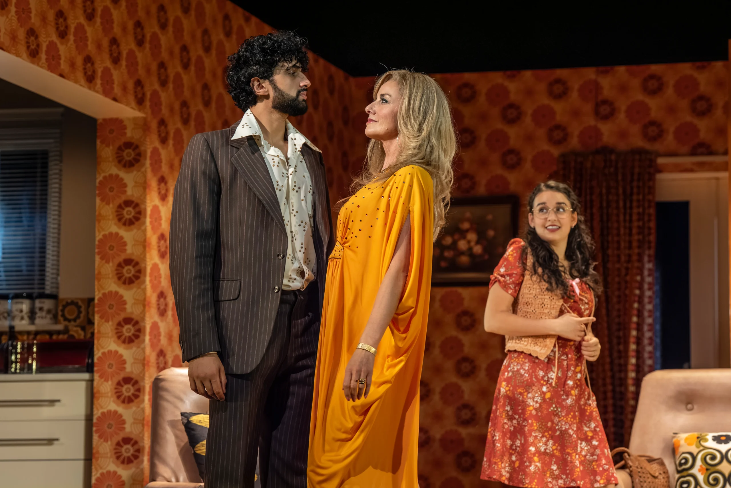 Tamzin Outhwaite as Beverly faces Omar Malik as Tony in Abigail's Party at the Harold Pinter Theatre