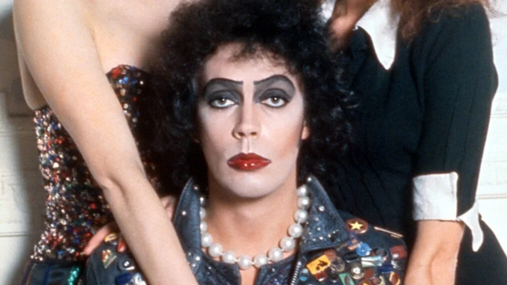 Tim Curry as Frank-N-Furter in corset and pearls in The Rocky Horror Picture Show