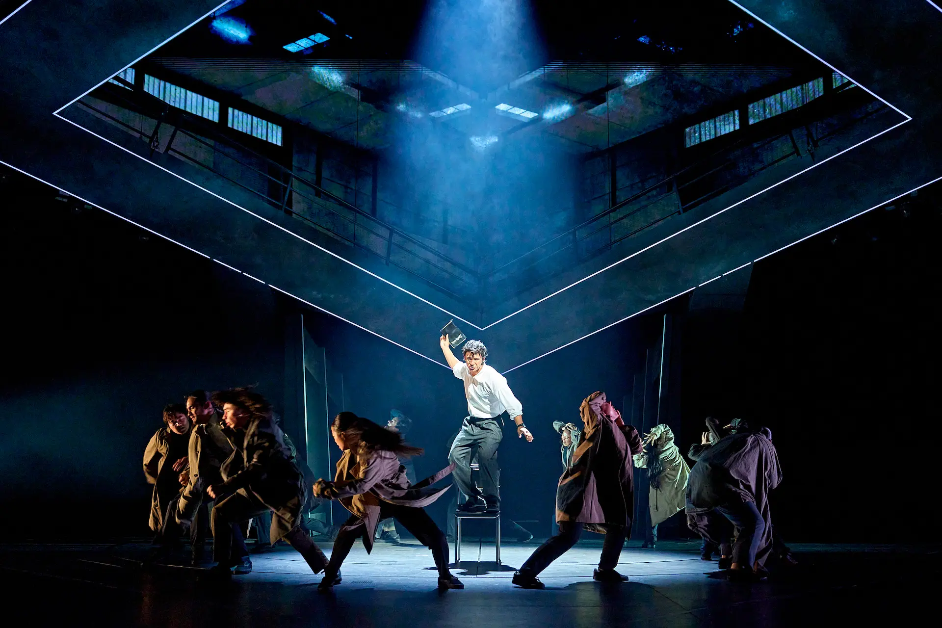 Death Note Musical star holds the killer notebook aloft on the Barbican stage