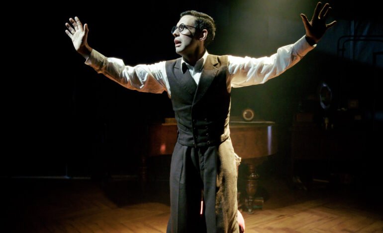 Benjamin O'Mahony as Shostakovich mid-performance in Holy Fool at Park Theatre