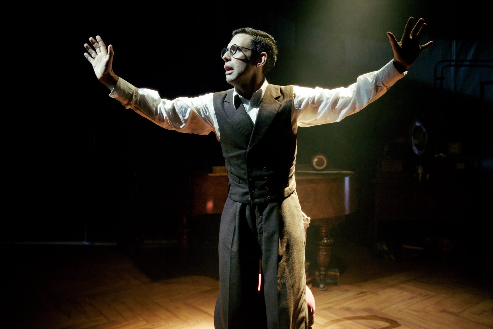 Benjamin O'Mahony as Shostakovich mid-performance in Holy Fool at Park Theatre