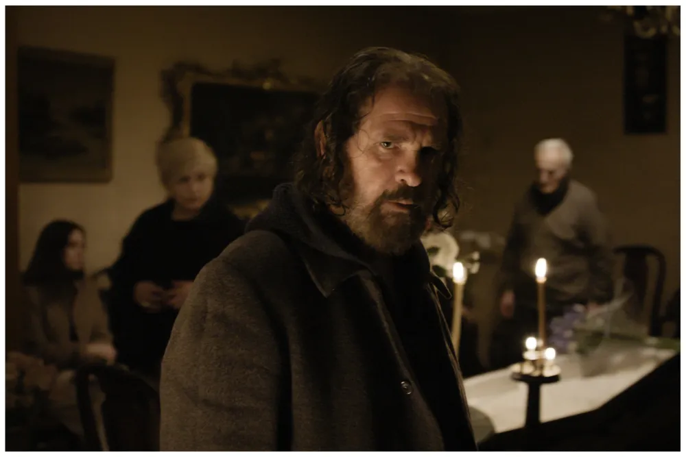 Dato Bakhtadze as Niaz in a candlelit scene from the film Supporting Role