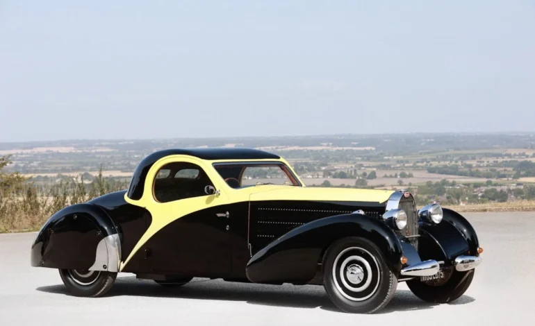 a black and yellow 1940 Bugatti Type 57 Atalante is one of the cars at the 2026 Royal Automobile Club Historic Awards