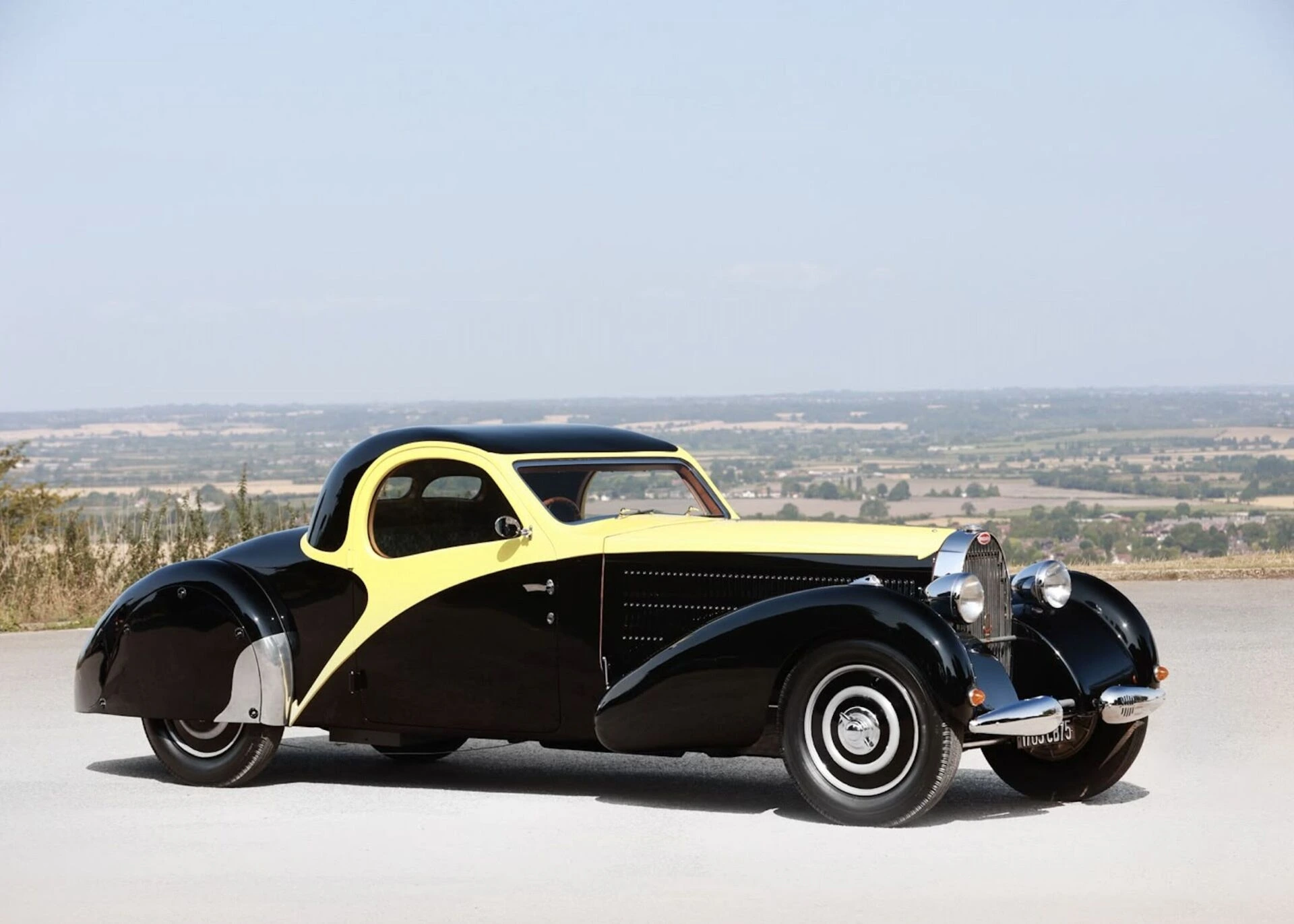 a black and yellow 1940 Bugatti Type 57 Atalante is one of the cars at the 2026 Royal Automobile Club Historic Awards