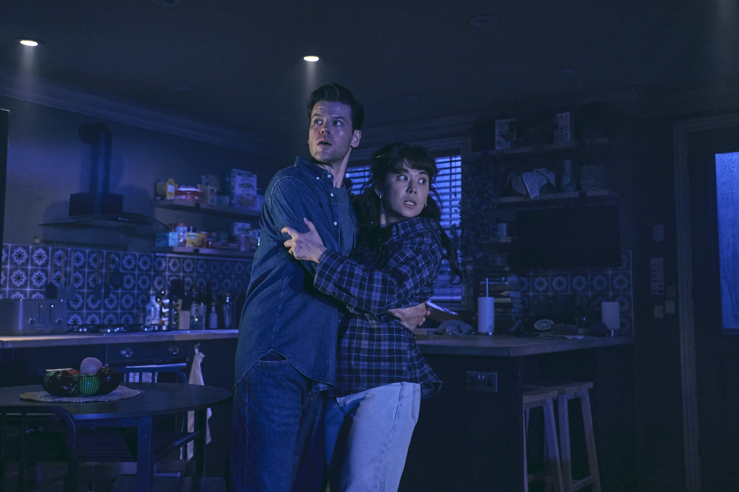 Ty Fanning and Ami Okumura Jones in Paranormal Activity at the Ambassadors Theatre